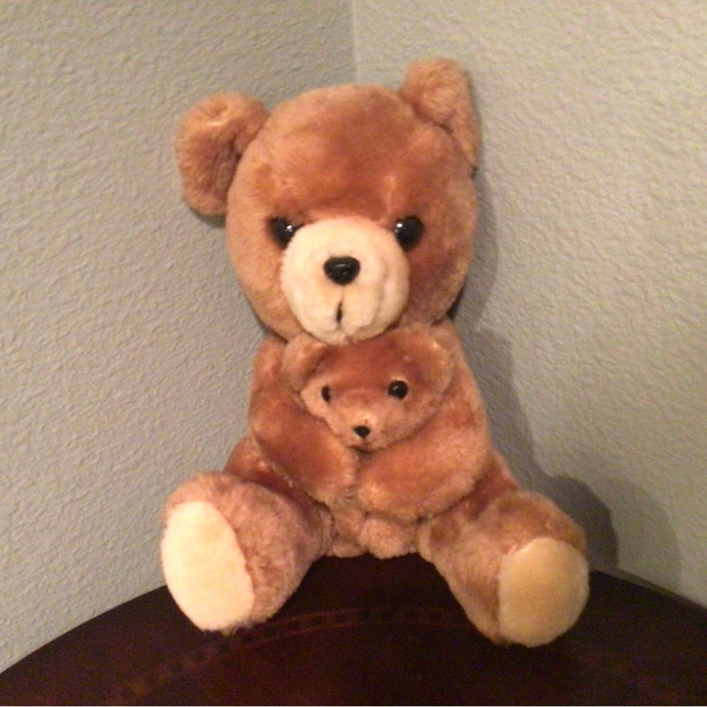 Mama Bear holding her detachable baby in her arms close